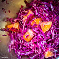 Red cabbage and orange salad, lime soy sauce and sesame oil dressing